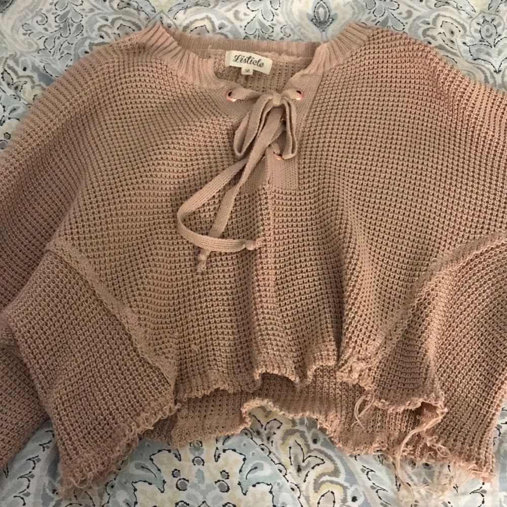 Raw edge, cropped sweater, with tie front
